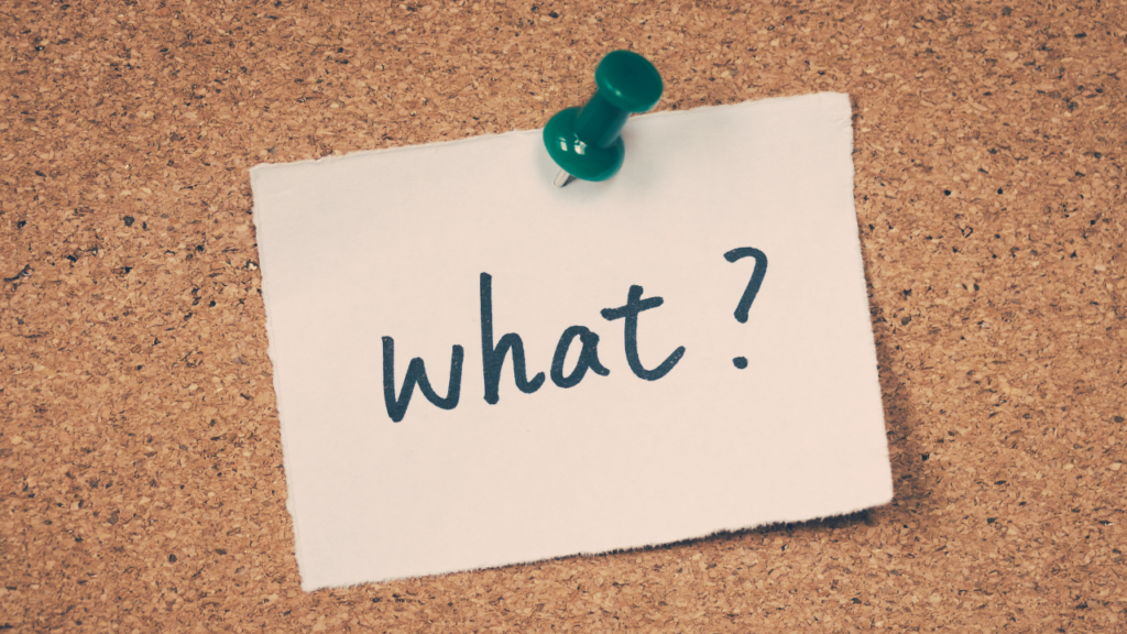 Whatと書かれた紙